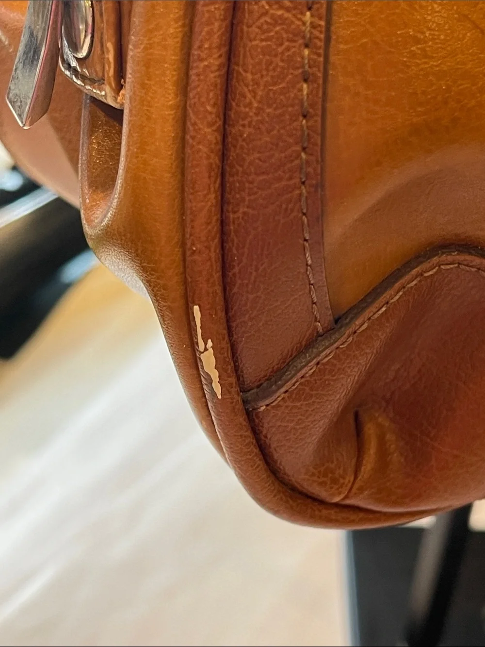Rina Rich Brown and Tan Leather and vinyl Handbag Label View